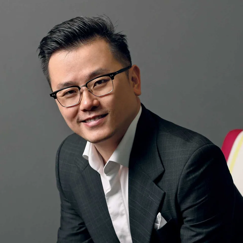 Dato' KK Chua in a formal portrait