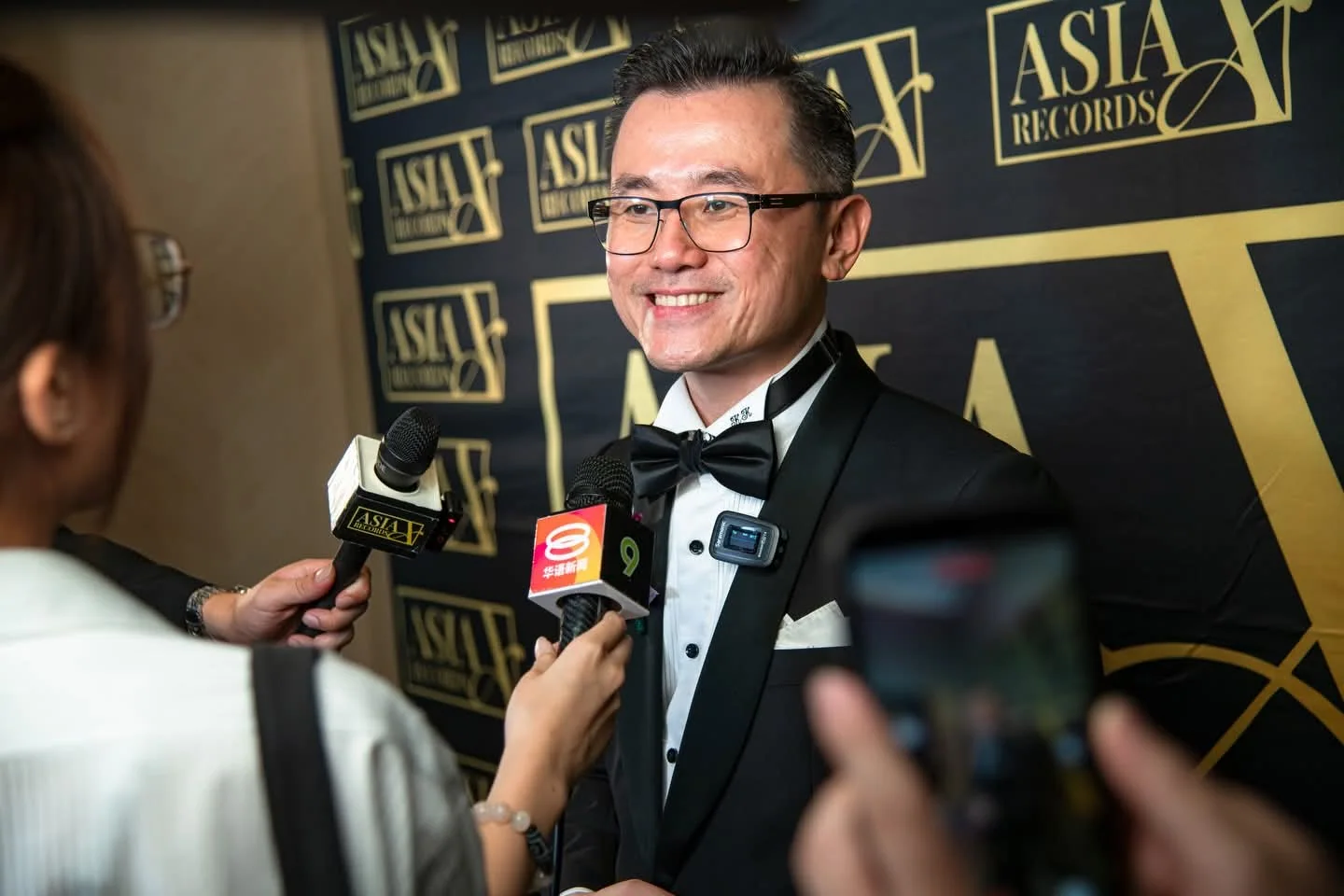 Dato' KK Chua speaking with media during an official Asia Record interview